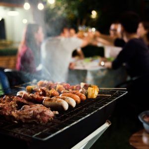 Dinner Party, Barbecue And Roast Pork At Night