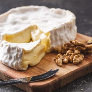 The Brie Cheese. Tasty Camembert And Walnuts.